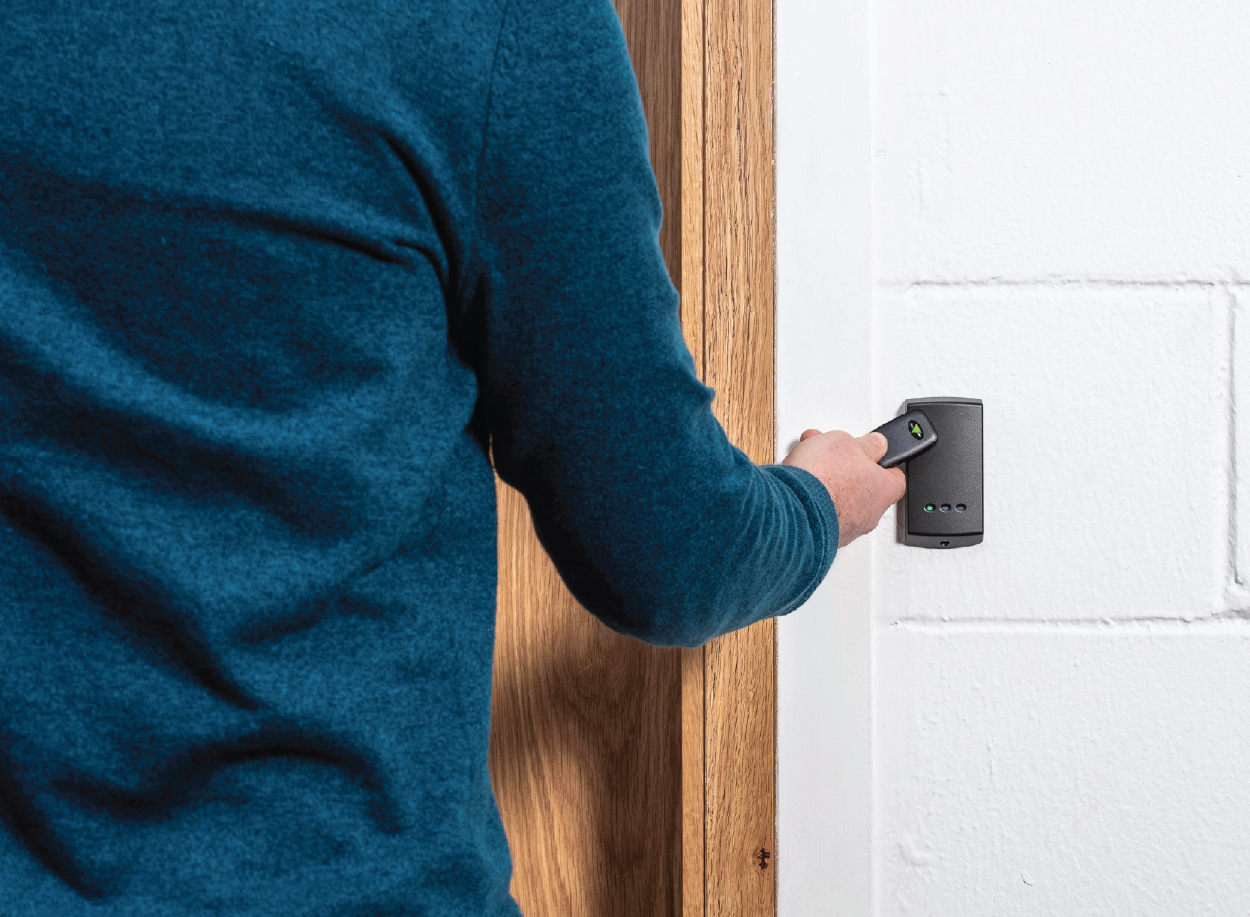 paxton key fob being scanned against a paxton reader to grant access